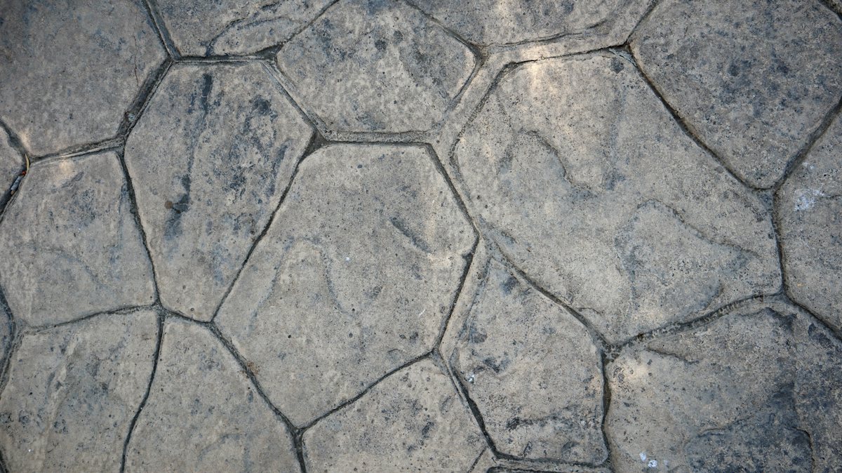 Close-up of gray paving with a stone-shaped pattern